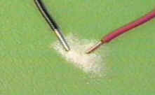 Solid NaCl (not conducting electricity)